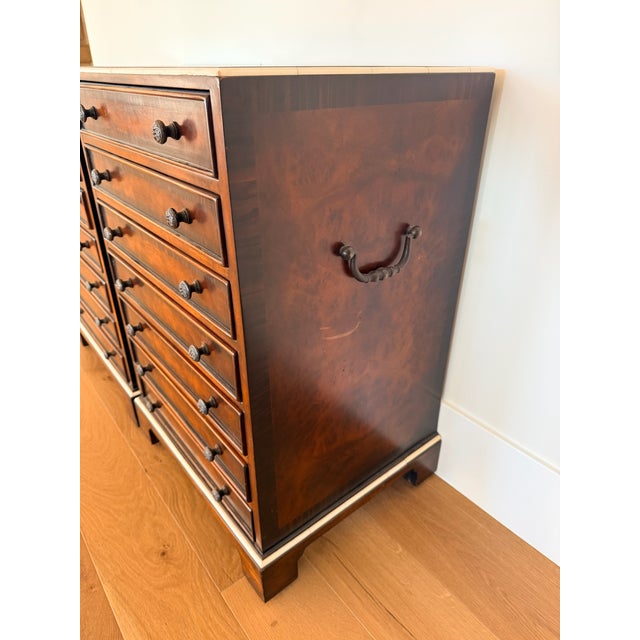 A pair of antique Victorian Wellington chests of drawers, crafted from rosewood with banded drawers, bail handles, floral...
