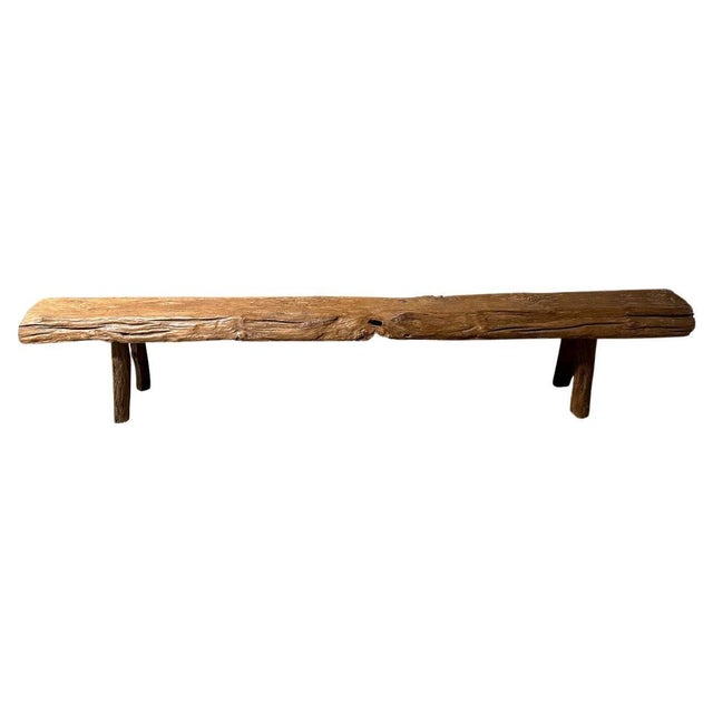 Impressive bench hand made from a single thick teak log with beautiful patina and character within the wood. This bench...