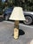 A striking table lamp crafted from an authentic antique wallpaper printing roller, showcasing the beautiful craftsmanship...