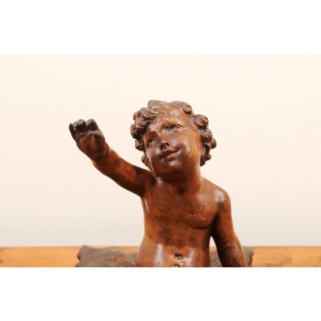 French 1780s Baroque Style Walnut Sculpture of Putto Sitting on a Pillow For Sale - Image 10 of 13