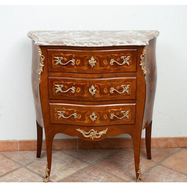Antique Napoleon III chest of drawers in fine exotic woods with marble top dating back to the second half of the 19th...