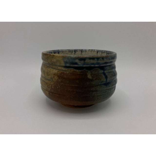 This is a vintage studio pottery Japanese style tea bowl by Eric Norstad (Bay Area California). The tea bowl has Norstad's...