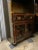 Circa 1960’s chinoiserie lacquered bookcase with one drawer and double doors. These are so incredibly beautiful! The brass...