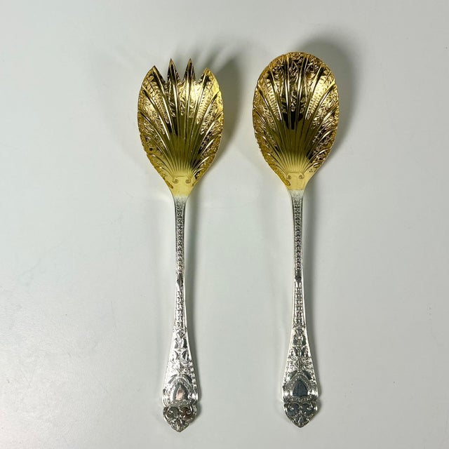 These are gorgeous. A set of Salad Utensils which the large serving fork and spoon that features gold electro plated cups...