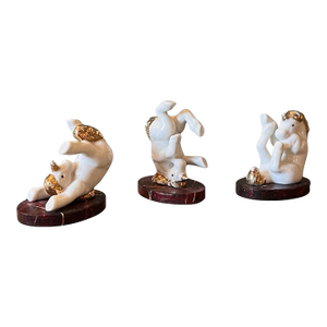 Set of 3 Vintage Tumbling Porcelain & Gilded Unicorn Figurines on the Faux Marble Stands