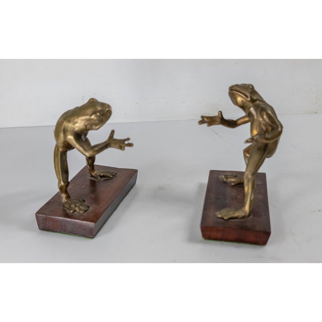 We are selling this great pair of Frog form bookends. These frogs are posed very playfully, almost like they are playing...