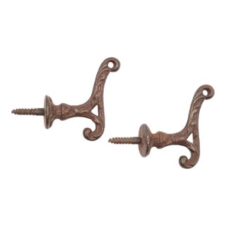 Pair of Antique Art Nouveau Cast Iron Wall Hooks For Sale