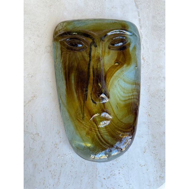 Vintage circa 1960s hand-forged glass face mask sculpture. Perfect to lay flat on a book, coffee table or can be hung...
