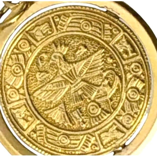 Vintage 14K Gold Aztec Calendar (Sun Stone) Medallion Pendant. Pendant features the Mexican eagle (golden eagle with wings...