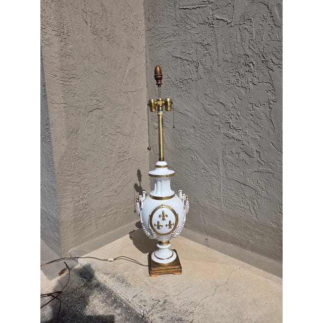 Beautiful large white glazed ceramic lamp with gold Fleur de lis made by the Marboro lamp company of Los Angeles back in...