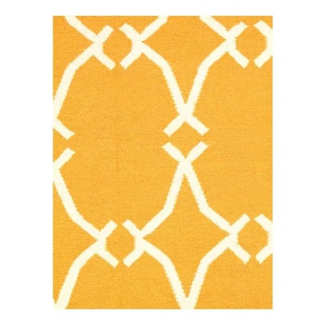 Unique handwoven flat weave rugs offer versatile design possibilities for modern interiors. Wool threads come together in...