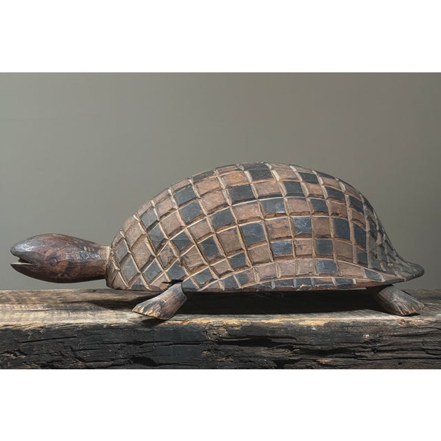 Antique hand carved folk art turtle sculpture featuring a fully rounded shell intricately carved with a squared, cubed...