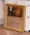 Elegant and versatile, this antique French Louis Philippe mirror was crafted circa 1870 and features a classic giltwood...