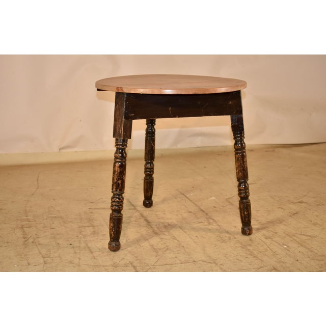 19th century pine cricket table from England. The top has lovely color and graining, and follows down to a base with a...