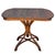 Rare late Victorian polished bent oak dining table by Mundus Thonet crafted from warm-toned bentwood with striking fluid...