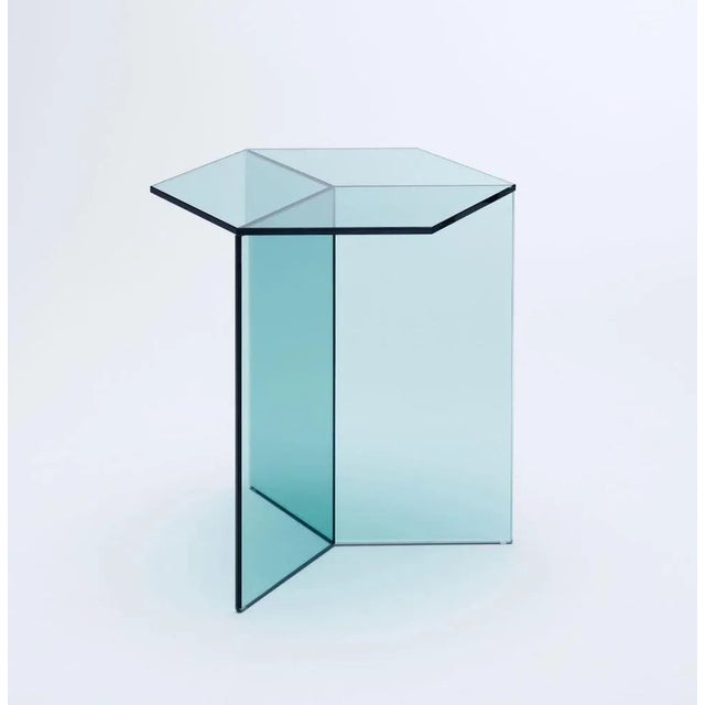 Clear glass "isom tall" coffee table - sebastian scherer dimensions: 50 h x 43 w x 50 d cm materials: solid colored glass...