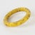This lovely vanilla and chocolate marble Bakelite bracelet bangle features a chunky tube shape, an intense yellow vanilla...