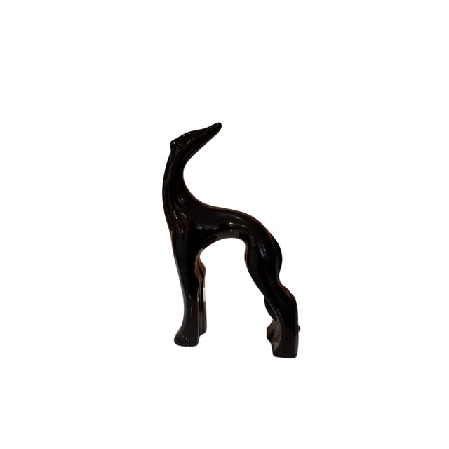 Elegant and chic vintage Royal Haeger black whippet ceramic statue. Dimensions: 22”H x 14”W x 5”D
