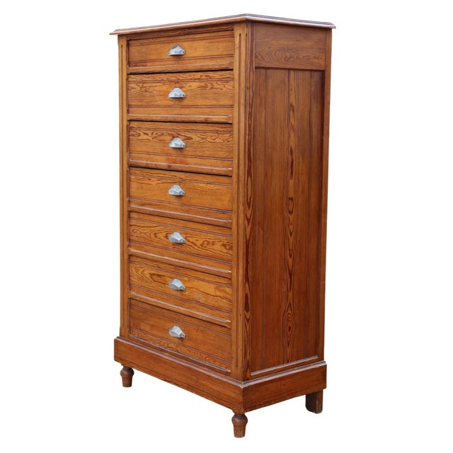 A substantial c.1900 pitch pine chest of drawers, full of lovely age, colour, and patina. While this rare decorative find...