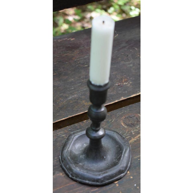 17th or 18th century pewter Dutch Candlestick. The original angel stamped hallmark indicates that it was Dutch made by H....