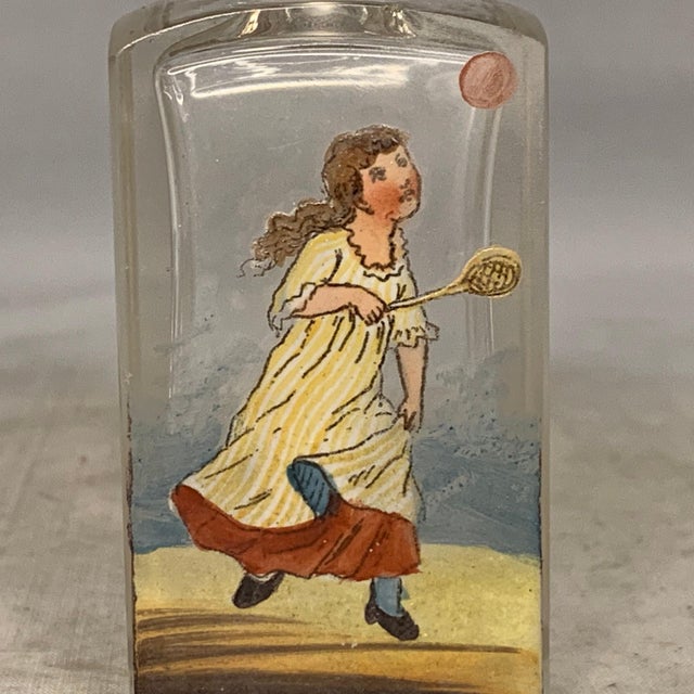 Unique Bohemian perfume or scent bottle with hand painted enamel sporting scene and cut crystal stopper for your...
