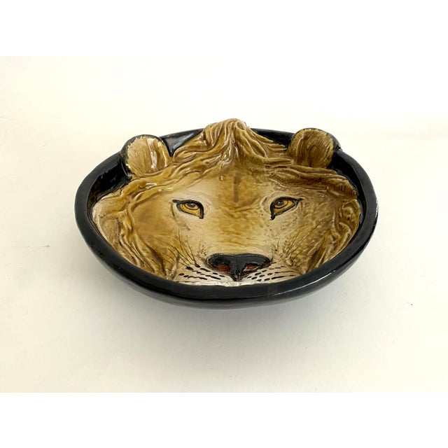 This Mid-Century Lion plate or shallow bowl was made in Italy in the 1970s. Known for their detailed hand painted design,...
