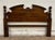 This is a beautiful vintage convertible Queen or Full sized traditional style pediment cannonball headboard. Wood appears...