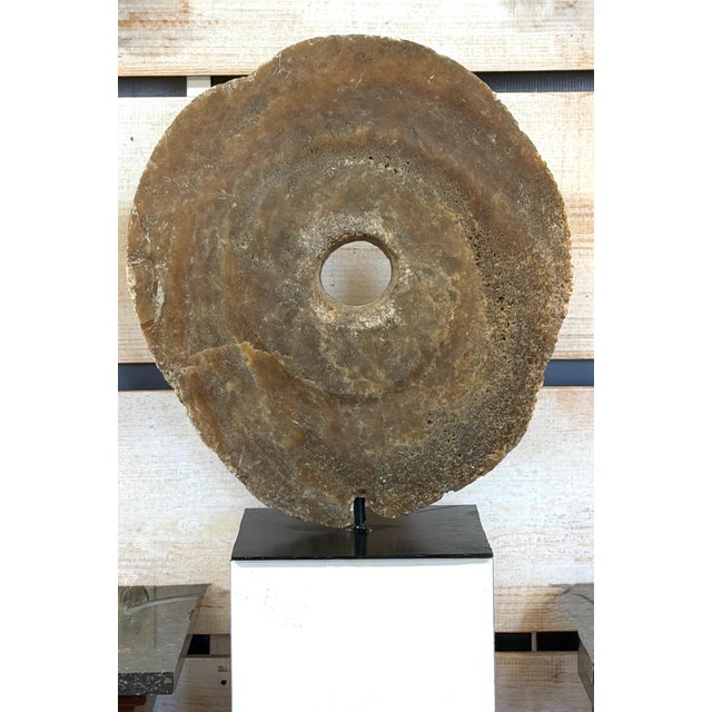 Large Yap Island Rai Stone (Fei), Pre-O’Keefe Type, 19th Century or Earlier, Mounted An authentic and highly compelling...