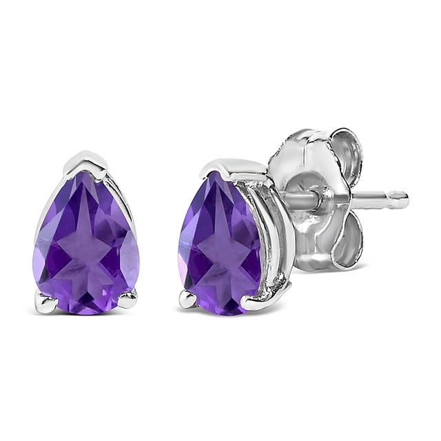 Envision the allure of glimmering amethyst isles each time you adorn these exquisite solitaire stud earrings, featuring...