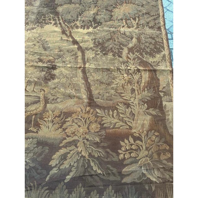Exceptional mid-20th-century French tapestry woven on Jacquard looms with wool, cotton and acrylic . .The "verdure" genre...