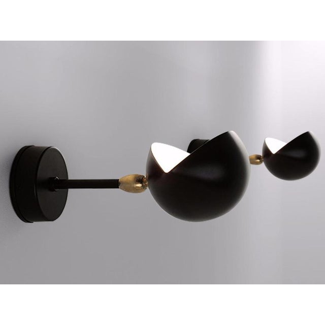 Sconce wall lamp model 'eye wall lamp' designed by serge mouille in 1956. Manufactured by editions serge mouille in...