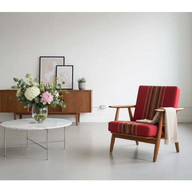 This stunning ge 240 armchair, designed by hans j. Wegner and produced by getama in the 1960s, is a perfect example of...