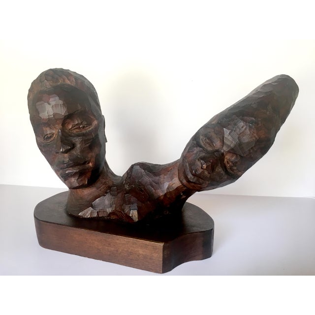 This striking piece of mid century modern sculpture is an incredible find. Heavy wood on a sturdy base with a superb...