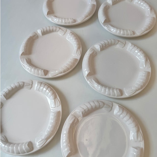 A wonderful set of 6 white ceramic 3D shrimp plates, perfect for serving appetizers or snacks. Made by Shafford Japan....