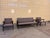 This set of three Belgian-made sofas consists of one two-seater and two armchairs, combining timeless design with modern...