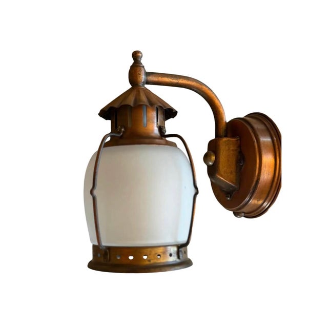 This copper lantern wall sconce is the perfect porch light for your entryway. The original copper has a great verdigris...
