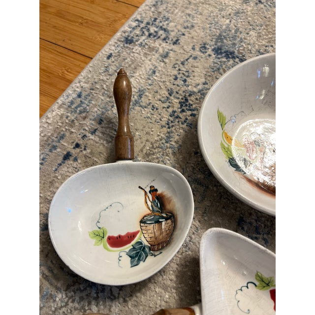 Up for consideration is a beautiful vintage collection of porcelain skillet dishes and appetizer set with wooden handles....
