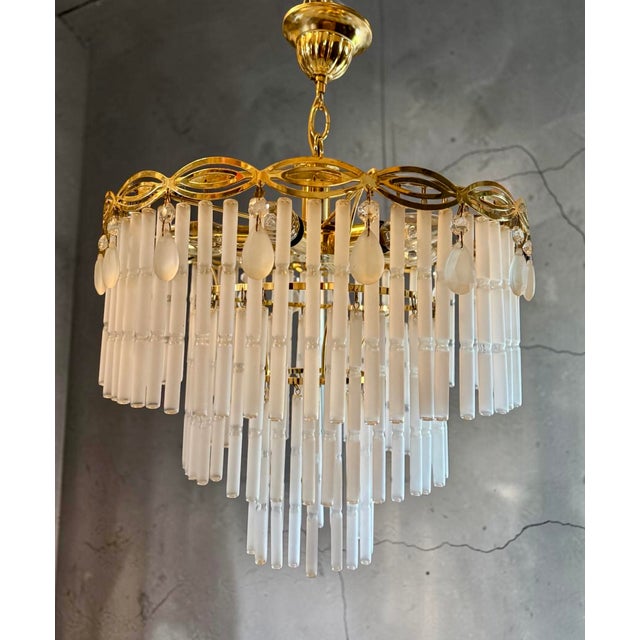 Chandelier with opaline glass rods, italy elegant italian chandelier manufactured by ideal lux, model roma/6. Featuring a...