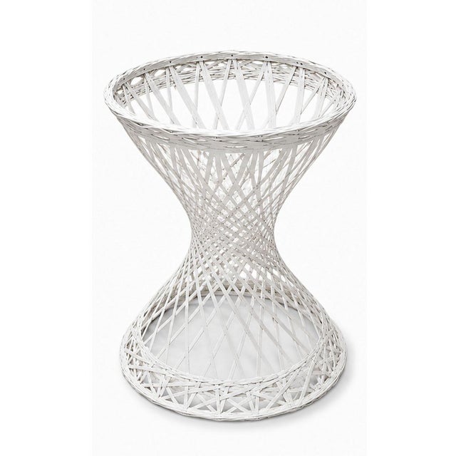 An elegant Mid-Century Modern spun fiberglass pedestal planter in the style of Russell Woodard. Featuring a graceful...