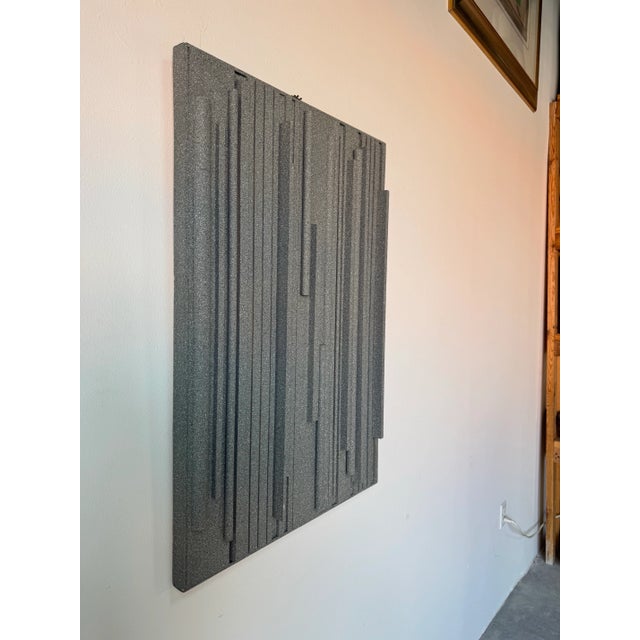 Striking 2002 mixed media wall sculpture titled “Lines of Stone Grey” by contemporary artist Hank Hecht. This work...