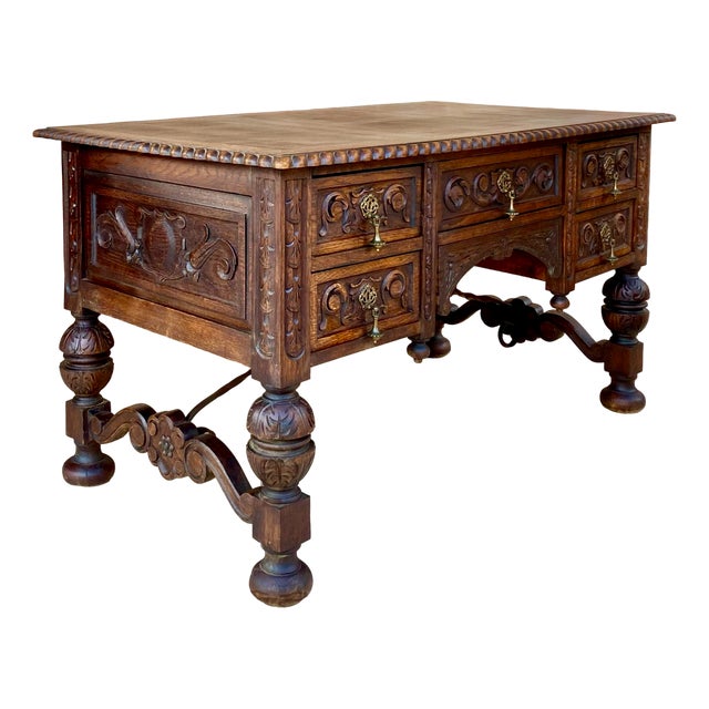 19th Century French Renaissance Hand Carved Desk or Writing Table with Carved Structure and Iron Stretcher For Sale