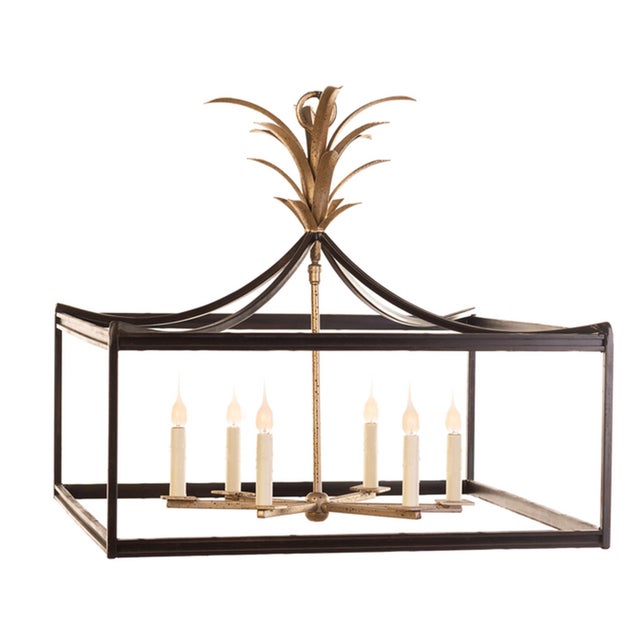 This exquisite box-like lantern was designed for lower ceiling heights and smaller spaces. The unique lantern style boasts...