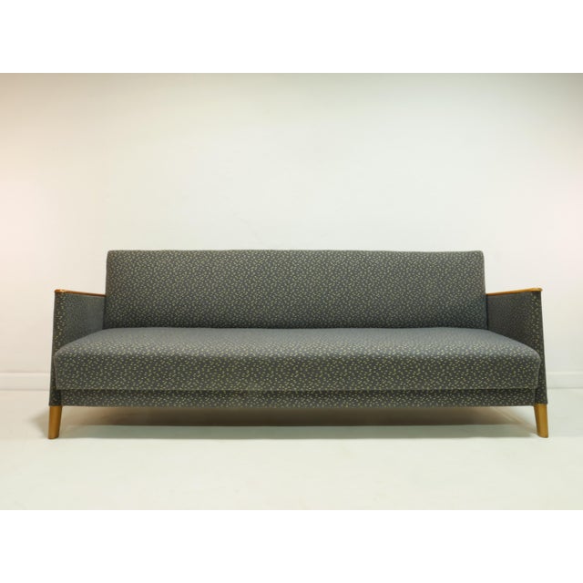 This original vintage sofa dates back to the 1960s and was manufactured by VEB Wohnkultur Kirchberg (Saxony). with its...