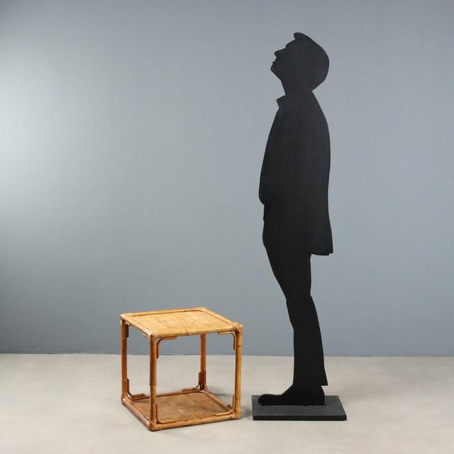 Wicker and bamboo coffee table from the 1970s-1980s, a perfect example of vintage design characterized by the use of...