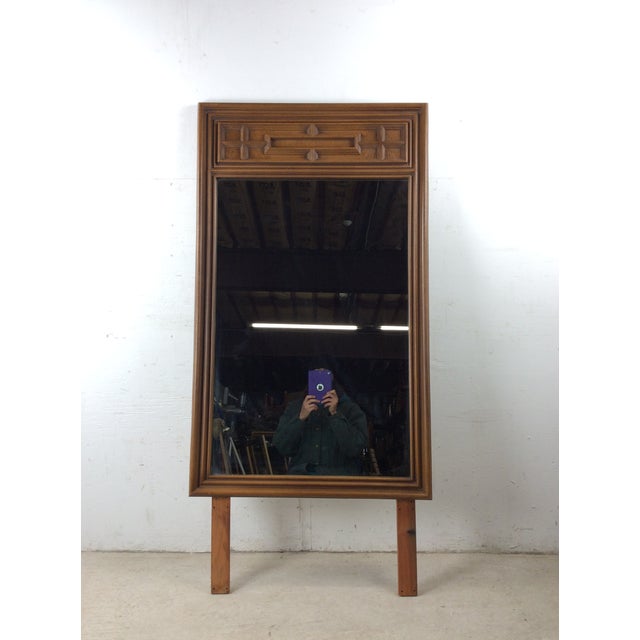 This mid century modern mountable mirror features hardwood construction and original walnut finish on the wood frame,...
