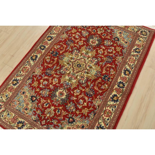 An authentic vintage traditional Qom rug, hand-knotted with fine wool and silk, dyed using natural colors. This...