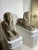 Large Identical pair of weathered white marble sphinxes with idealized female faces. Now on modern, custom wood pedestals,...