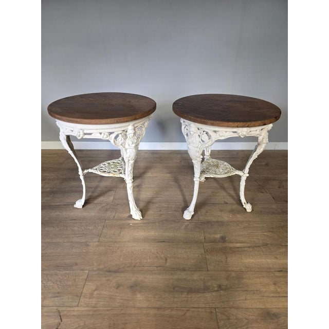 Victorian Britannia Pub Tables in Cast Iron with Oak Tops, Set of 2, in Very Good conditions.