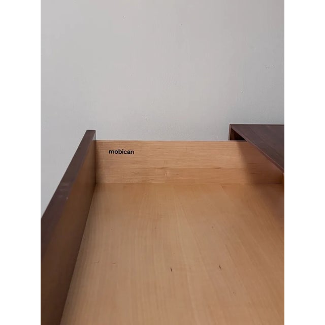 Mobican walnut highboy dresser. Dresser has 7 drawers. Excellent condition. Push release on drawers. Well made. Ready to...