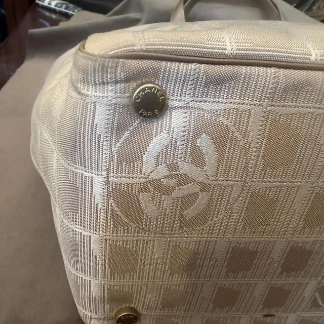 A 2003 Chanel New Travel Line Beige Nylon and Brown Leather Tote Bag For Sale - Image 11 of 15